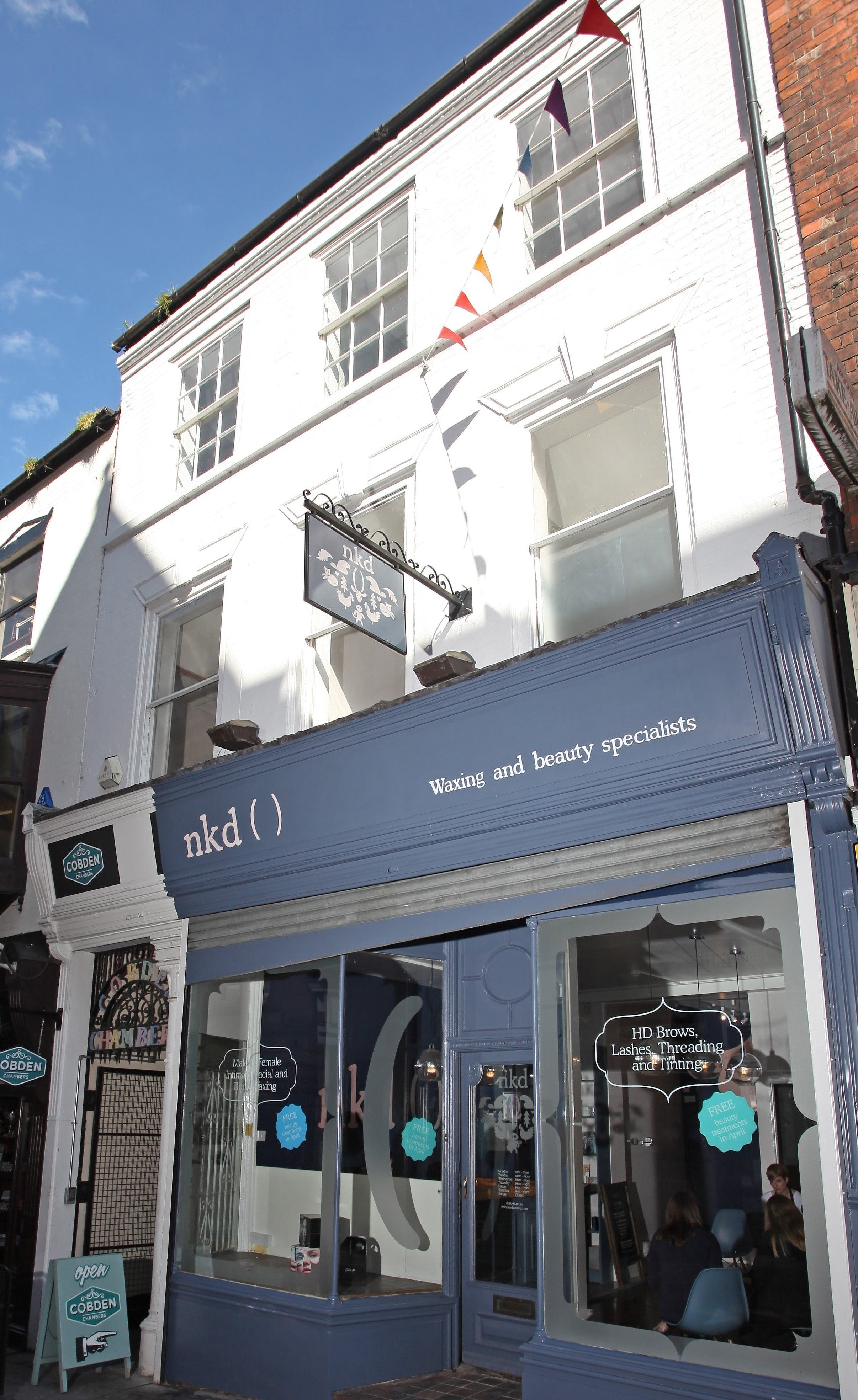 nkd shop view comparing L'Oreal and nkd pre- and post-hair removal products